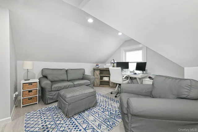 a living room with furniture and a couch