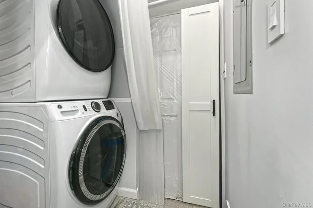 a utility room with dryer and washer