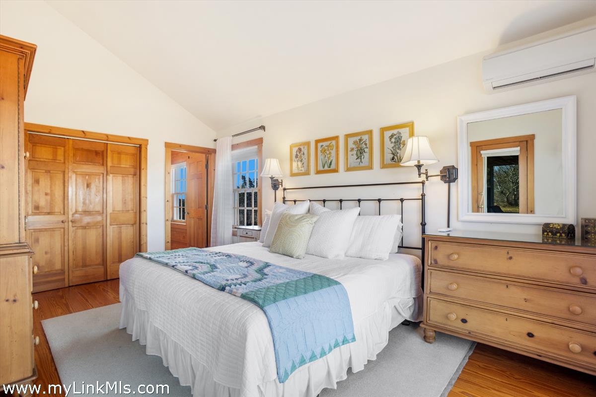13 Eat Fire Spring Road Nantucket, MA 02554 - Photo 23 of 43 a bedroom with a bed and a dresser
