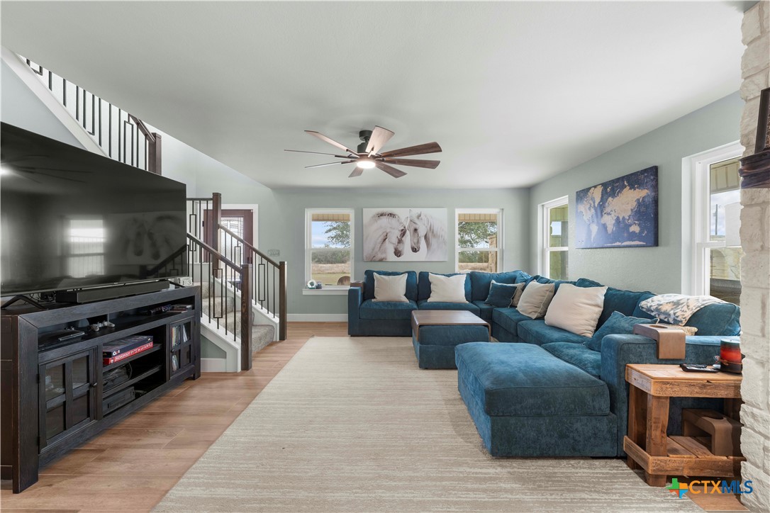 8901 Brewer Lane Salado, TX 76571 - Photo 11 of 30 a living room with furniture and a flat screen tv