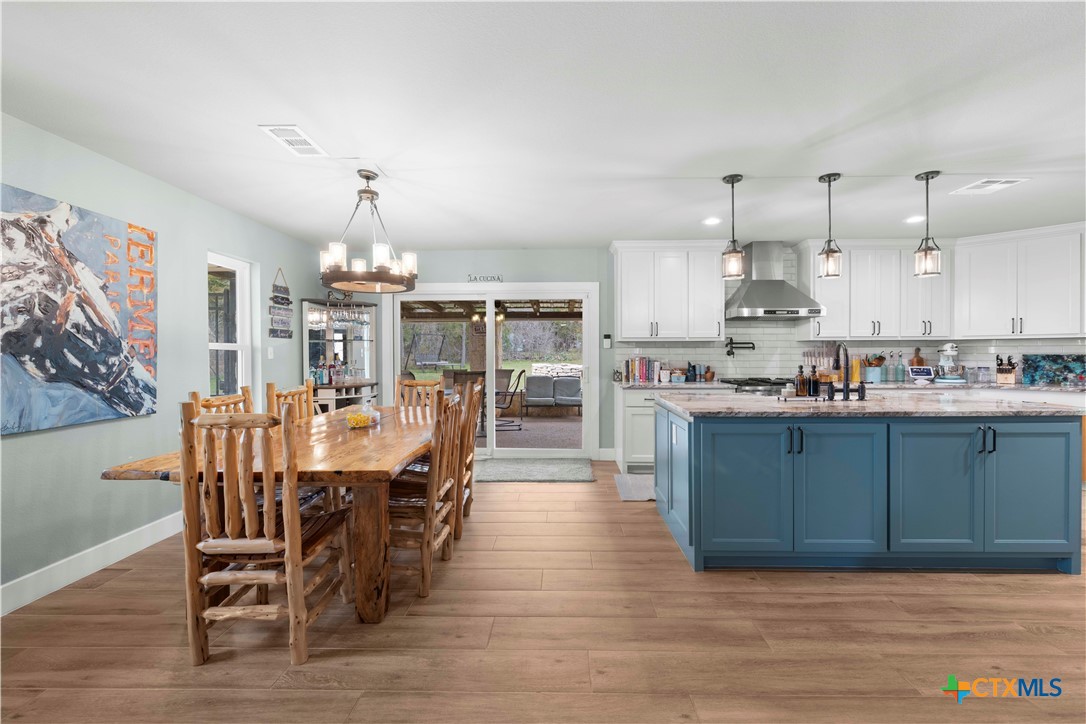 8901 Brewer Lane Salado, TX 76571 - Photo 12 of 30 a view of a kitchen and dining room