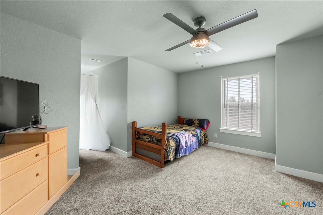 8901 Brewer Lane Salado, TX 76571 - Photo 26 of 30 a bed room with a bed and a window
