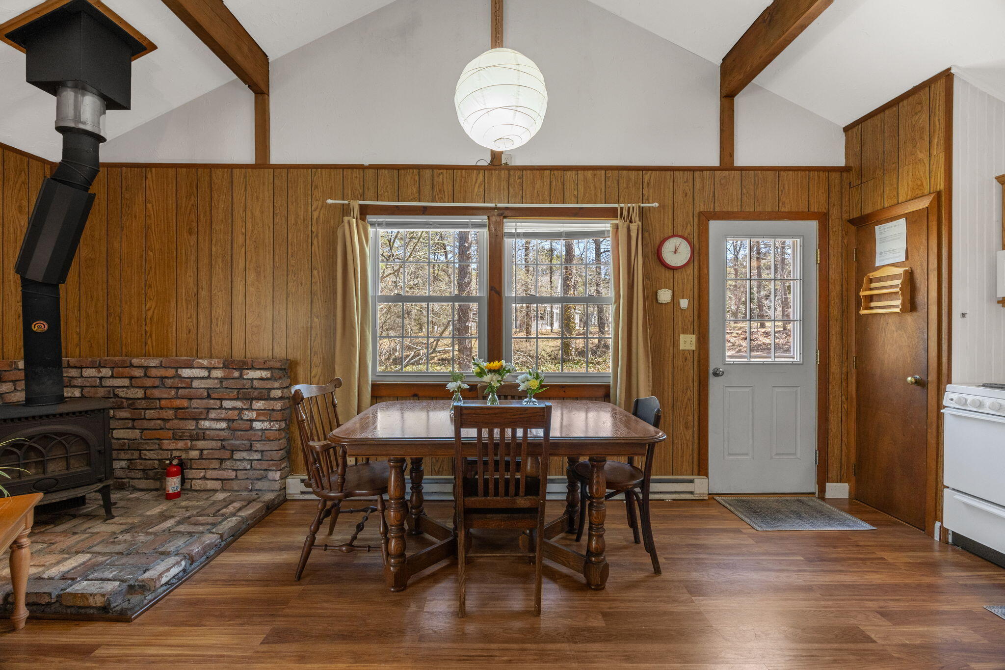 60 Long Avenue, Unit A Wellfleet, MA 02667 - Photo 7 of 28 a view of a dining room with furniture window and wooden floor