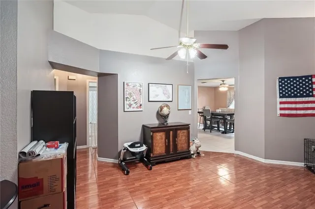 a kitchen with stainless steel appliances a refrigerator sink and microwave