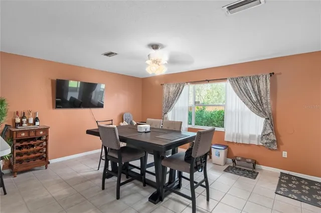 a kitchen with stainless steel appliances a refrigerator and a stove