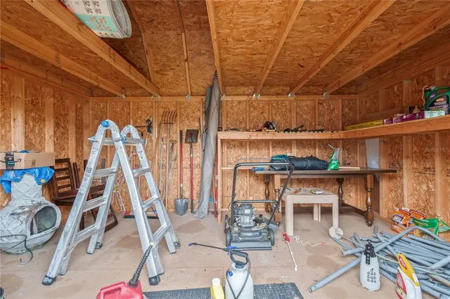 a view of a house with backyard and garden