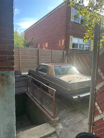 a view of barbecue grill and living room