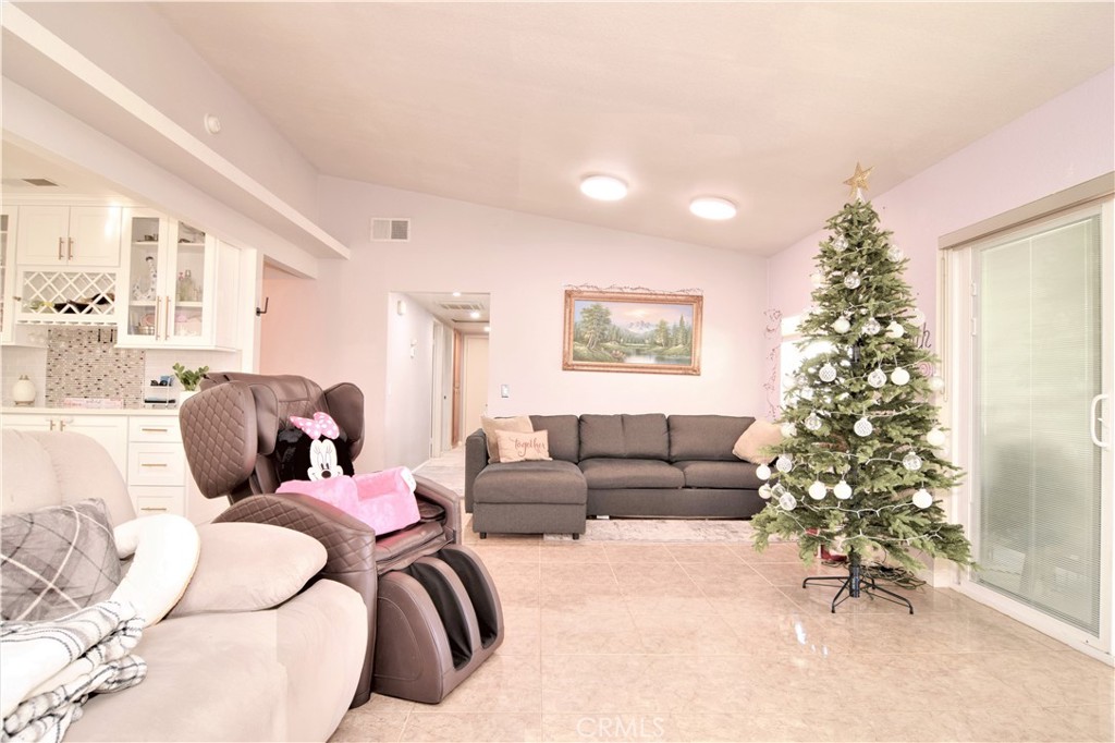 39334 Willowvale Road Palmdale, CA 93551 - Photo 7 of 21 a living room with furniture and a christmas tree