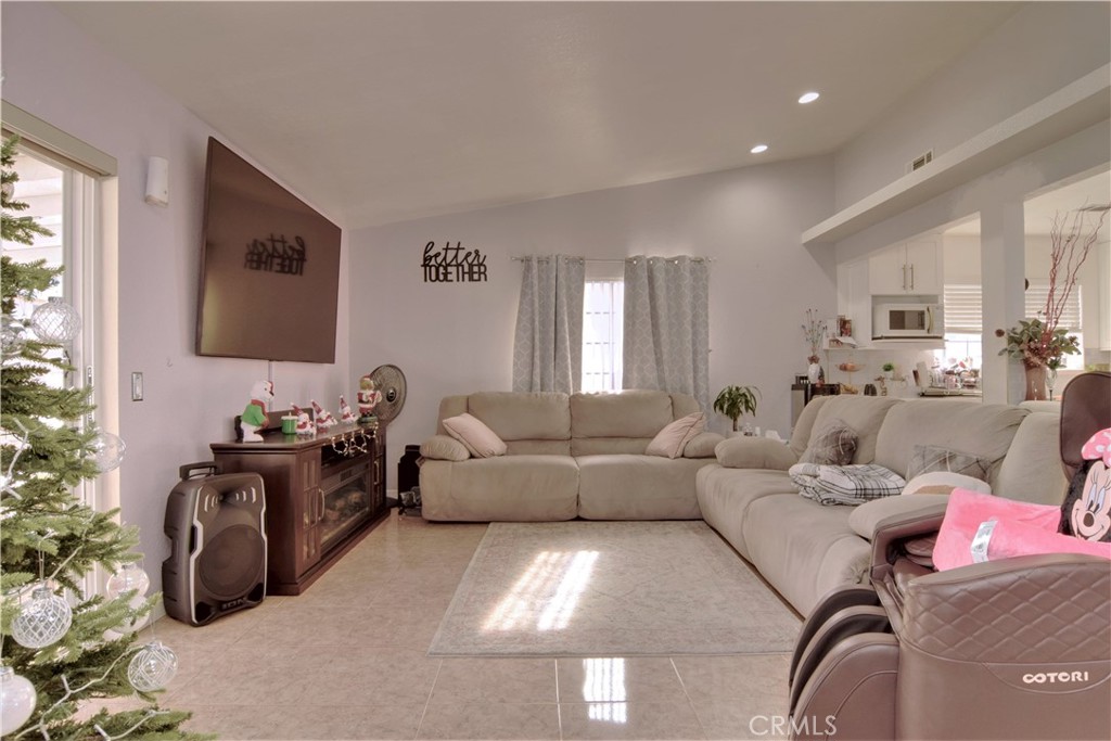 39334 Willowvale Road Palmdale, CA 93551 - Photo 8 of 21 a living room with furniture and wooden floor