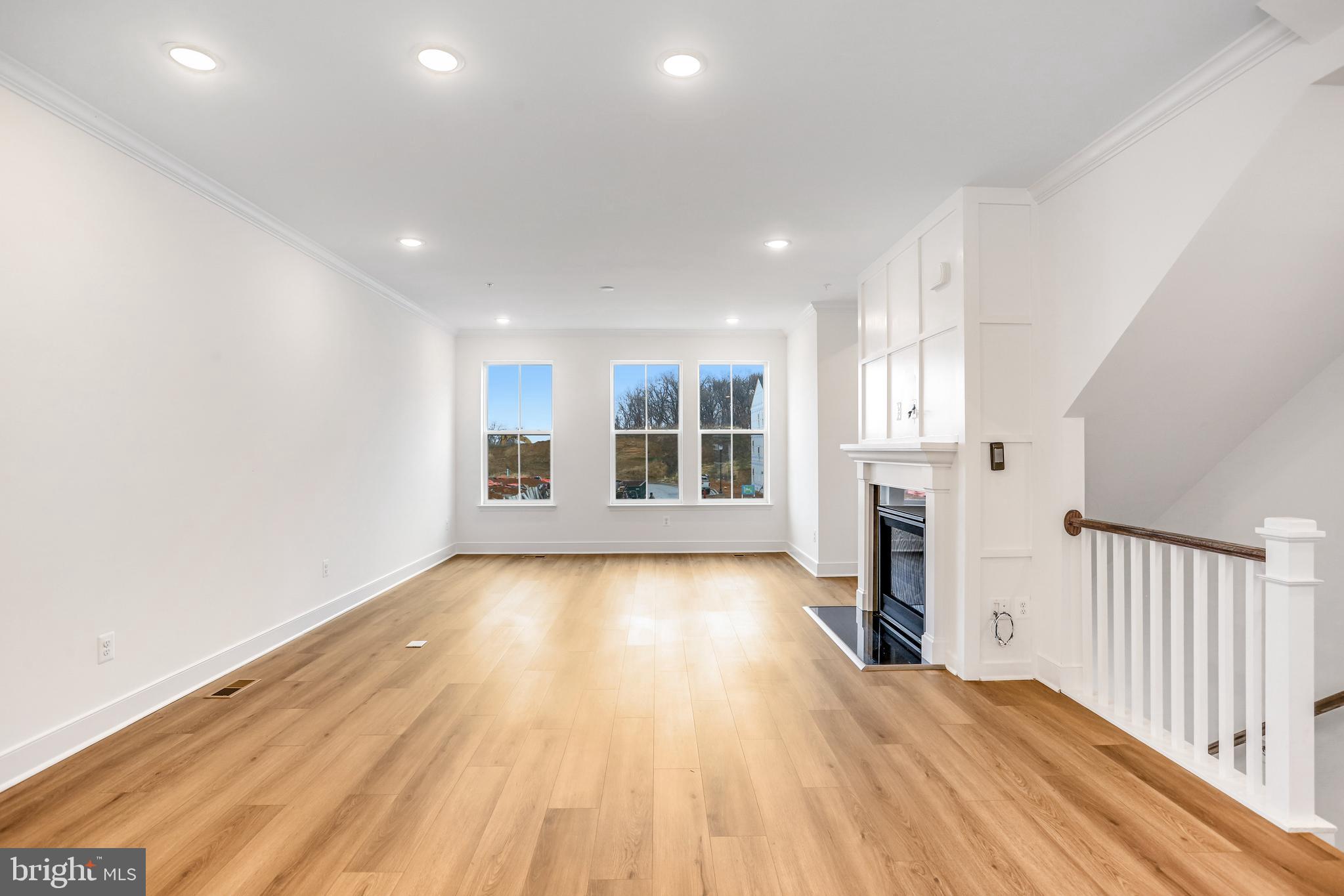 1889 Shookstown Road Frederick, MD 21702 - Photo 19 of 47 a view of a big room with wooden floor and windows