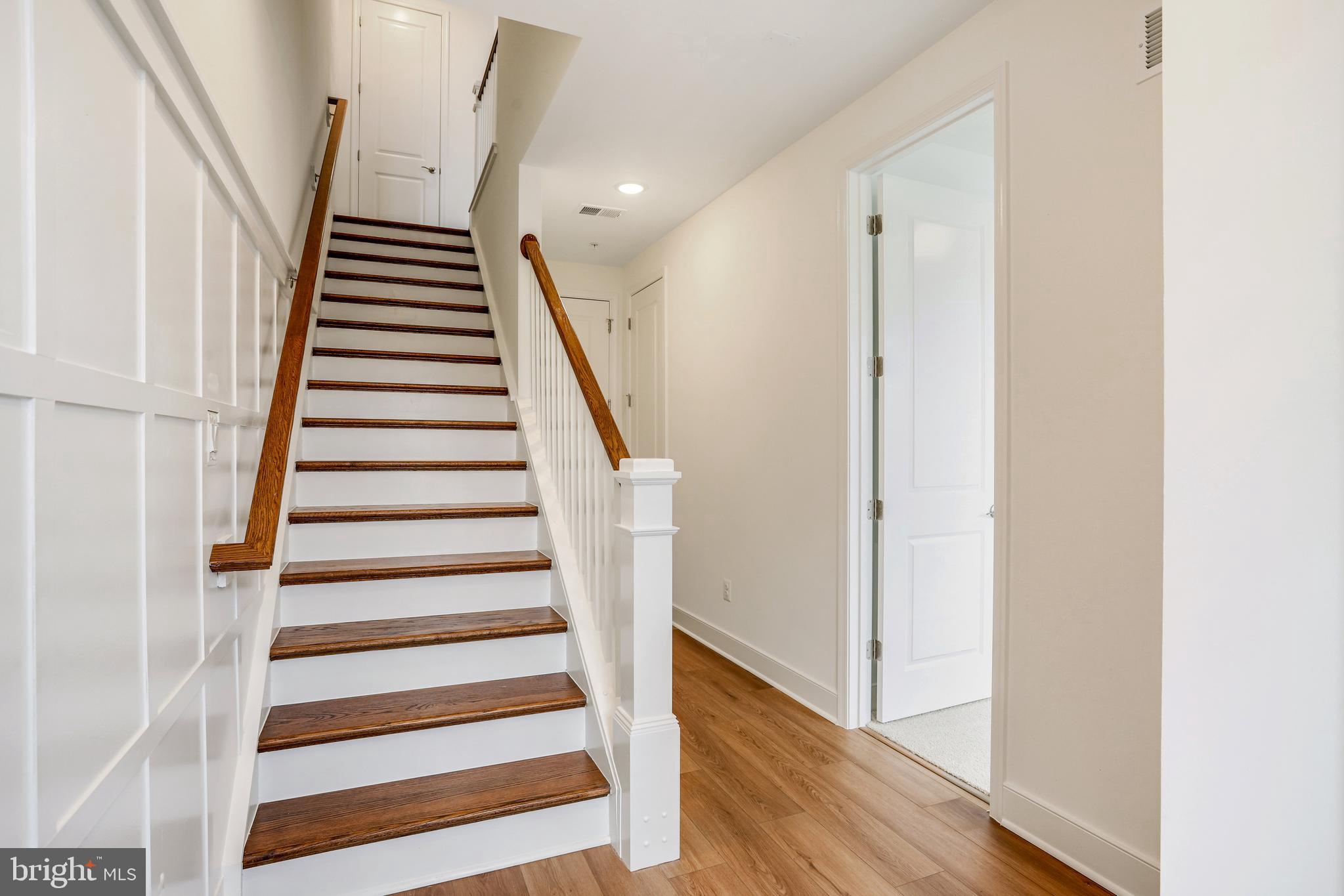 1889 Shookstown Road Frederick, MD 21702 - Photo 4 of 47 a view of entryway with wooden floor and stairs