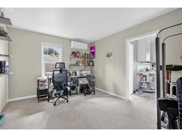 a view of a workspace with furniture