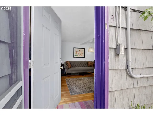 a view of a bedroom from the hallway