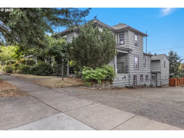 a view of a house with a street