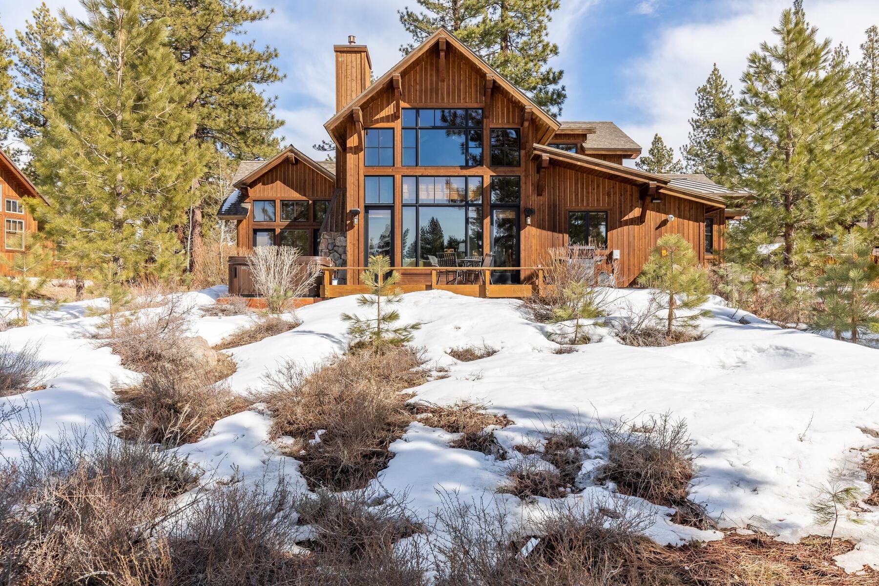 12229 Lookout Loop, Unit F513 Truckee, CA 96161 - Photo 2 of 28 a front view of a house with a yard covered in snow