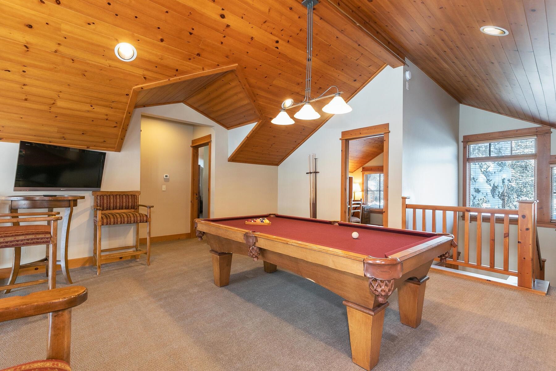 12229 Lookout Loop, Unit F513 Truckee, CA 96161 - Photo 23 of 28 a pool table chairs and flat screen tv