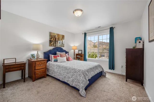 a en suite bathroom with a sink and a shower
