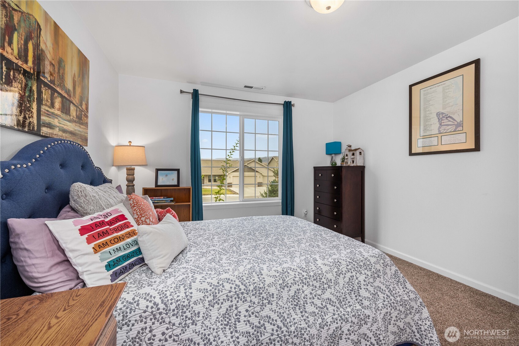 479 Spring View Place Chelan, WA 98816 - Photo 20 of 37 a bedroom with a bed and a couch