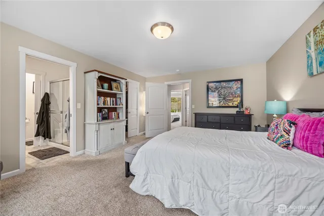 a view of a house with wooden roof and sitting space