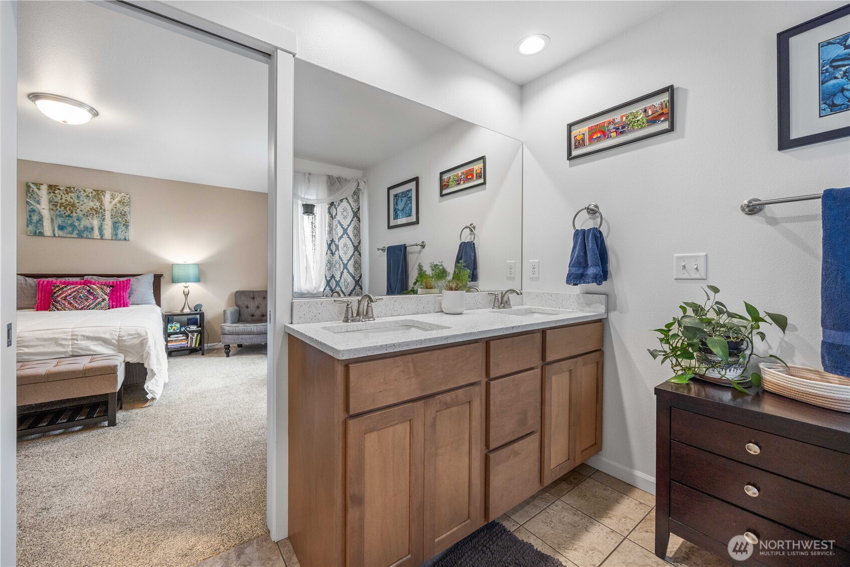 479 Spring View Place Chelan, WA 98816 - Photo 24 of 37 a en suite bathroom with a sink and a mirror