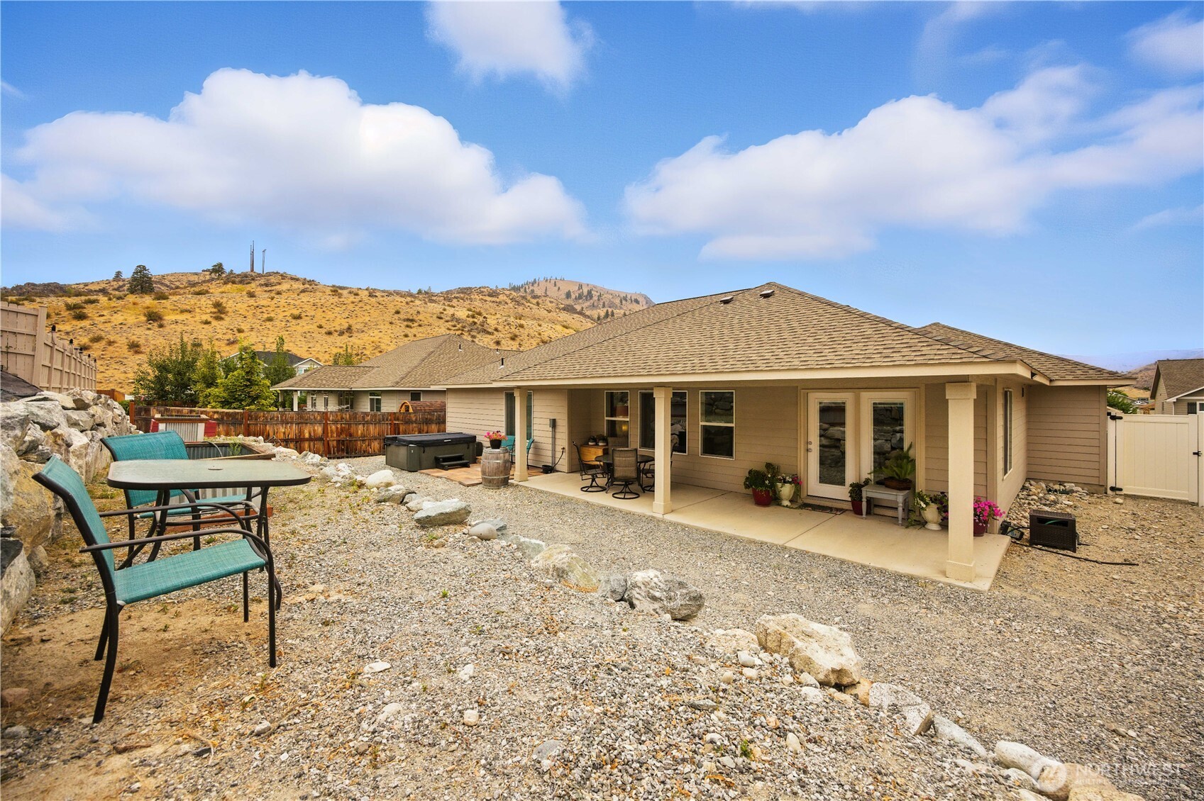 479 Spring View Place Chelan, WA 98816 - Photo 30 of 37 a view of a house with wooden roof and sitting space