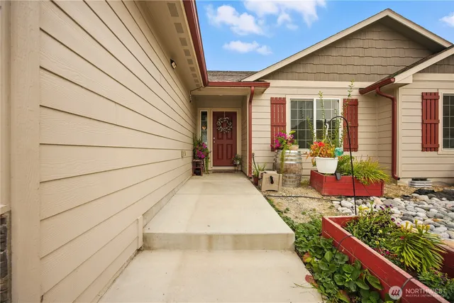 a view of a living room and a chandelier