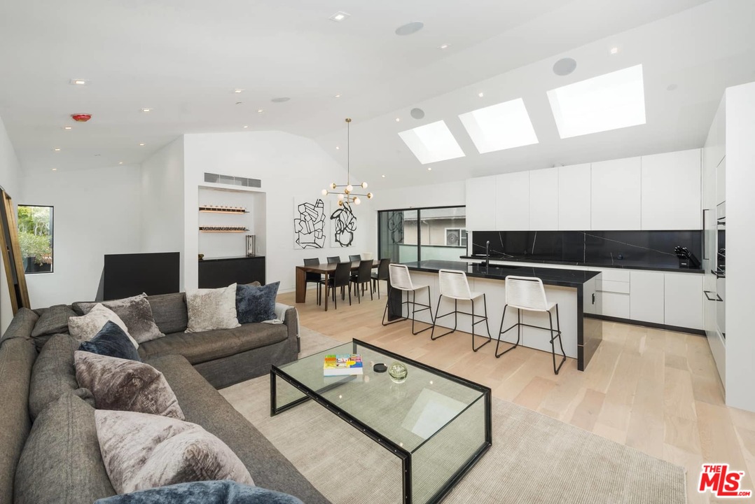 629 Sunset Avenue Venice, CA 90291 - Photo 11 of 31 a living room with furniture and view of kitchen