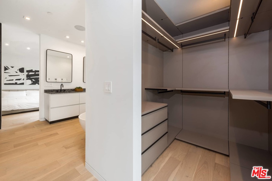 629 Sunset Avenue Venice, CA 90291 - Photo 17 of 31 a kitchen with a refrigerator and white cabinets