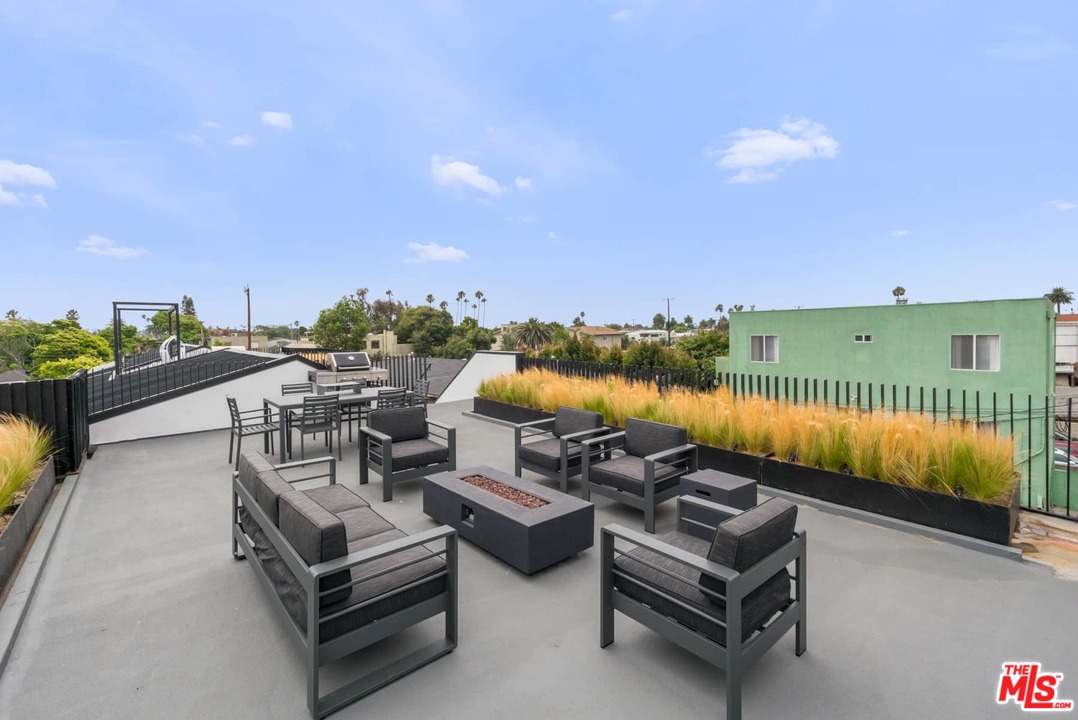 629 Sunset Avenue Venice, CA 90291 - Photo 29 of 31 a terrace with outdoor seating and ocean view