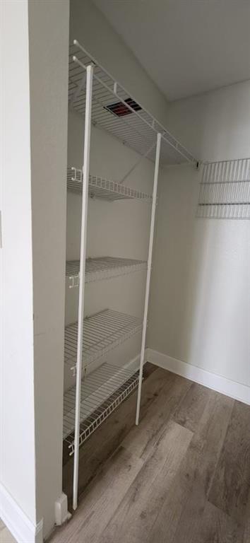 1830 Radius Drive, Unit 1003 Hollywood, FL 33020 - Photo 10 of 12 a view of an empty walk in closet