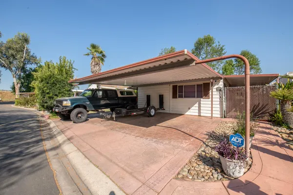 a view of a house with a patio