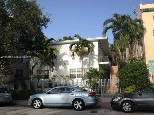 a car parked in front of a house