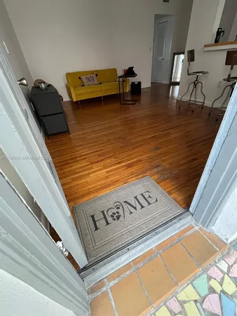 a view of a living room with furniture