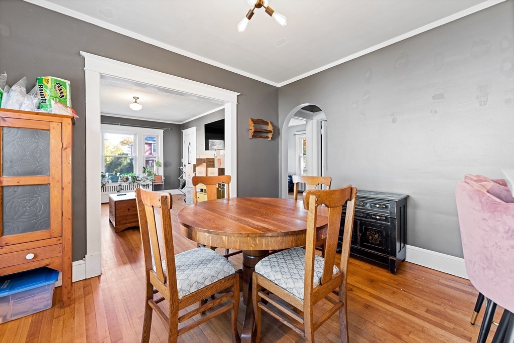39 Catherine Street Pittsfield, MA 01201 - Photo 12 of 36 a view of a dining room with furniture and wooden floor
