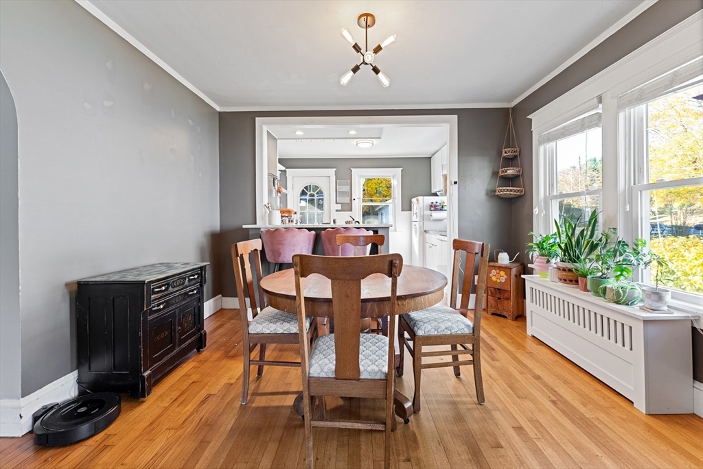 39 Catherine Street Pittsfield, MA 01201 - Photo 14 of 36 a view of a dining room with furniture window and wooden floor