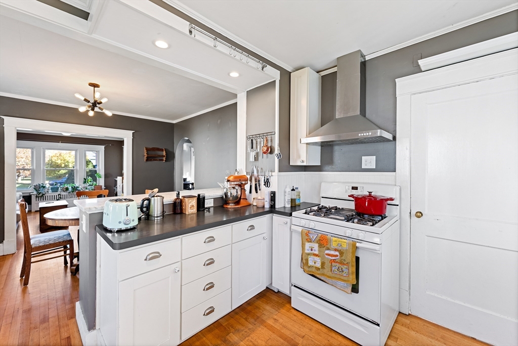 39 Catherine Street Pittsfield, MA 01201 - Photo 16 of 36 a kitchen with a sink stove and cabinets