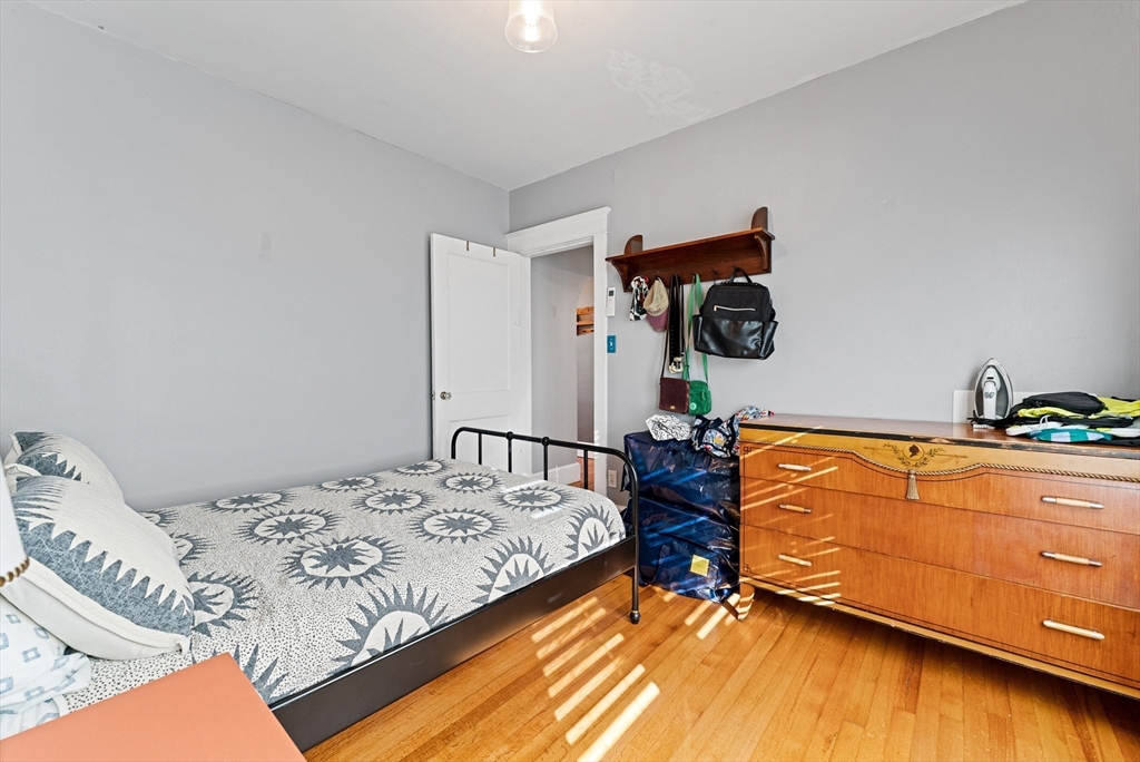 39 Catherine Street Pittsfield, MA 01201 - Photo 21 of 36 a bedroom with bed and wooden floor