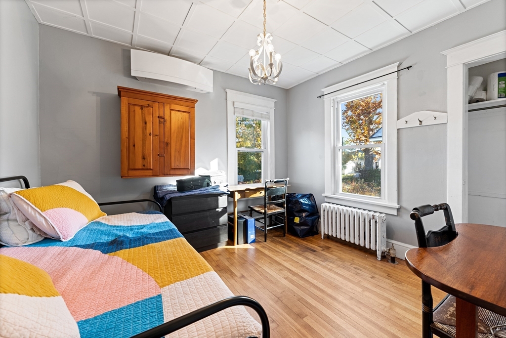 39 Catherine Street Pittsfield, MA 01201 - Photo 24 of 36 a bedroom with furniture and a window