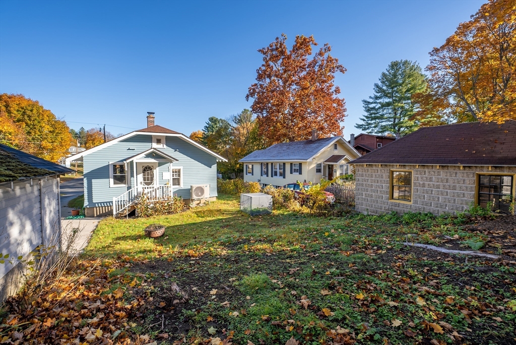 39 Catherine Street Pittsfield, MA 01201 - Photo 34 of 36 a front view of a house with a yard