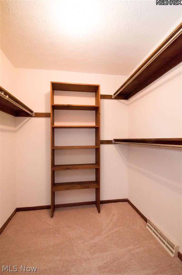 2610 Addyston Road Akron, OH 44313 - Photo 11 of 20 Walk-in Closet - 6x6 with built in wood shelves, all 3 bedrooms feature this closet!
