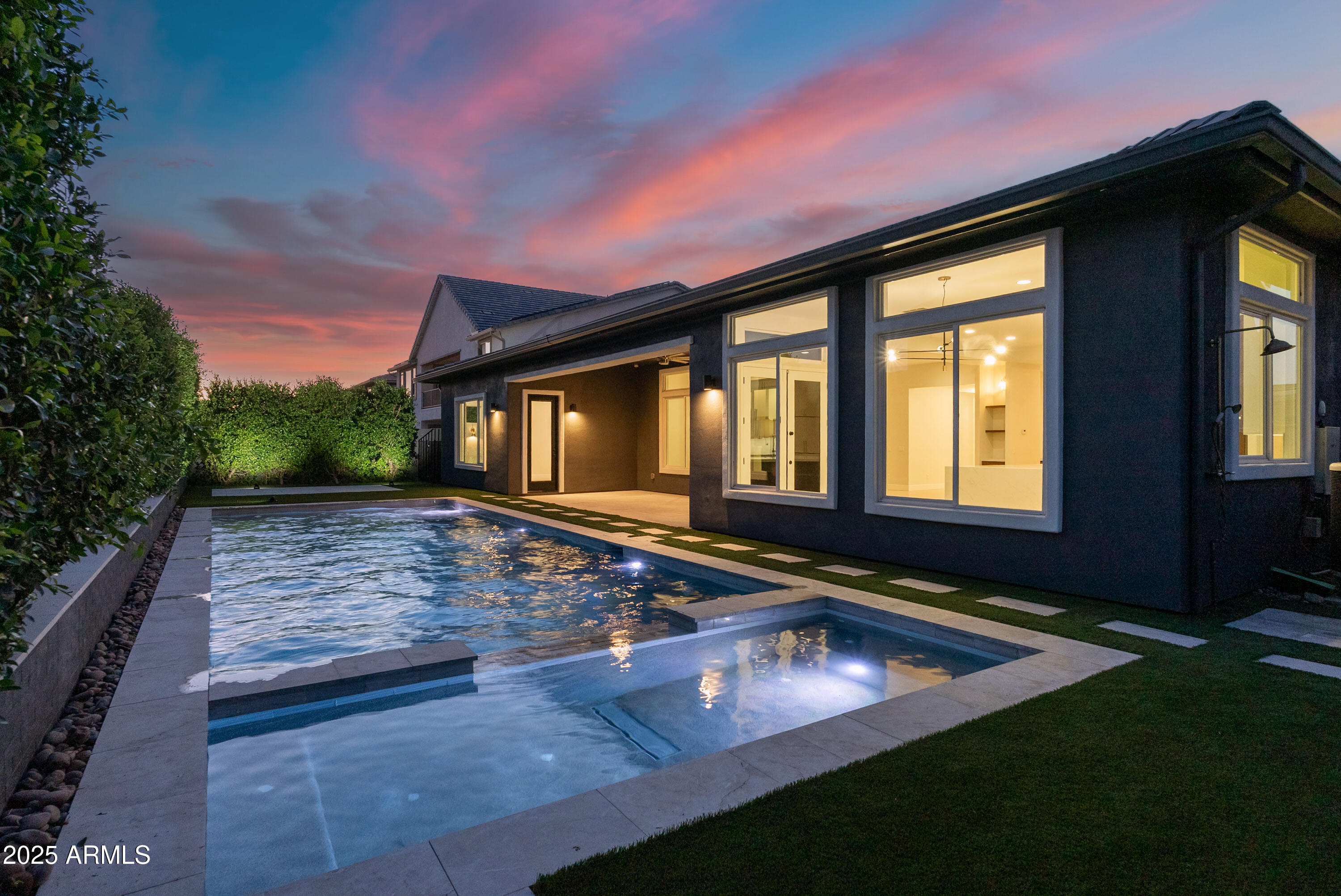 3145 East Boot Track Trail Gilbert, AZ 85296 - Photo 3 of 17 a view of house with swimming pool yard fire pit and outdoor seating