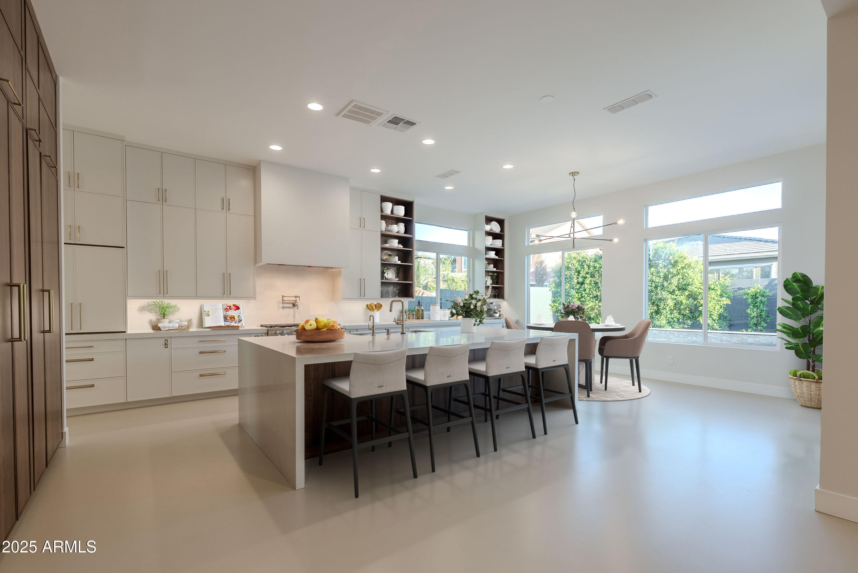 3145 East Boot Track Trail Gilbert, AZ 85296 - Photo 7 of 17 a dining hall with stainless steel appliances kitchen island granite countertop furniture and a living room view