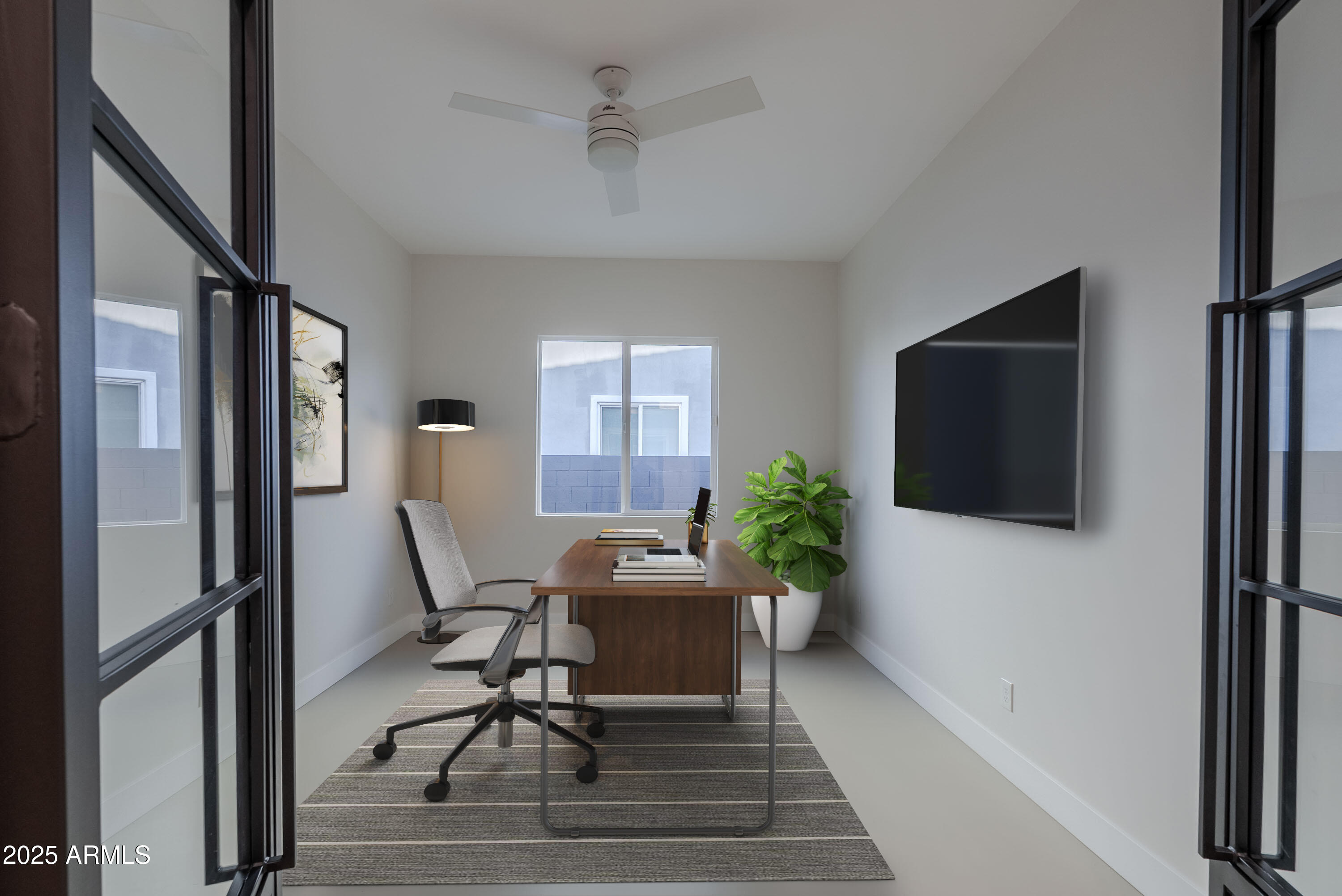3145 East Boot Track Trail Gilbert, AZ 85296 - Photo 9 of 17 a workspace with furniture and a potted plant