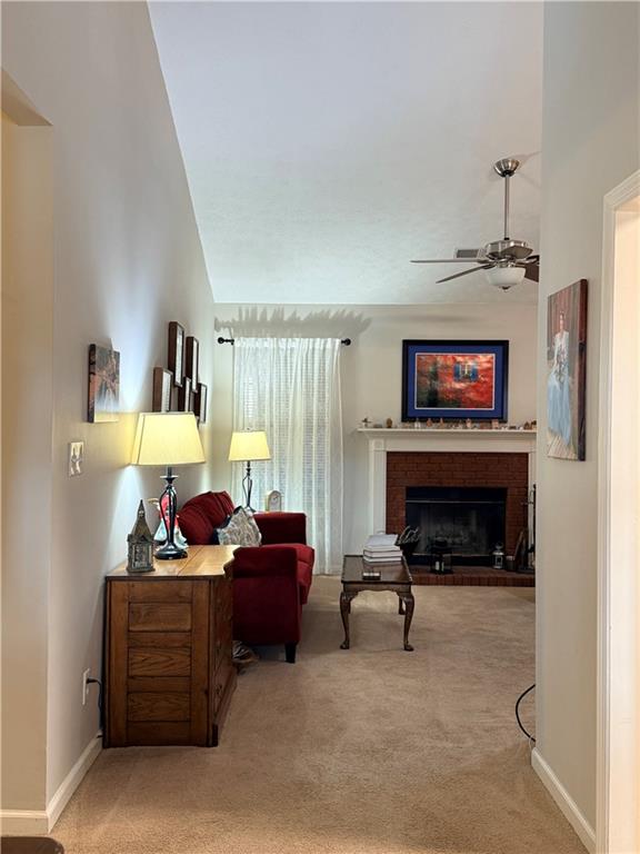 3680 Hamilton Dam Road Dacula, GA 30019 - Photo 2 of 33 a living room with furniture a fireplace and a flat screen tv