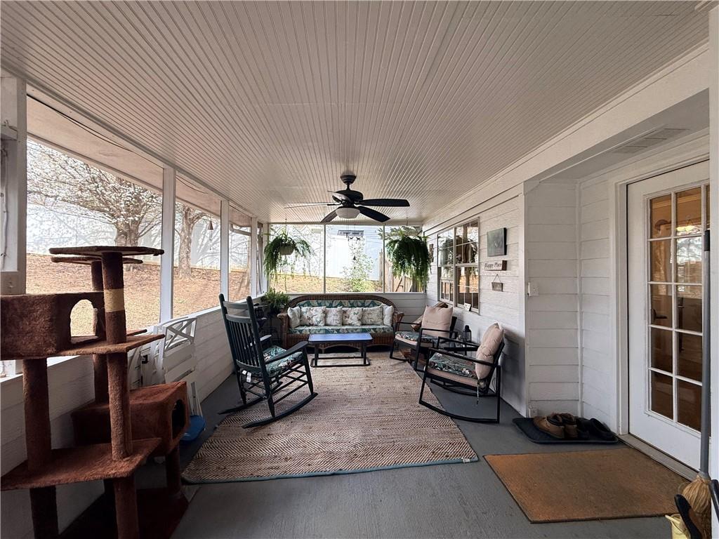3680 Hamilton Dam Road Dacula, GA 30019 - Photo 24 of 33 a living room with furniture rug and window