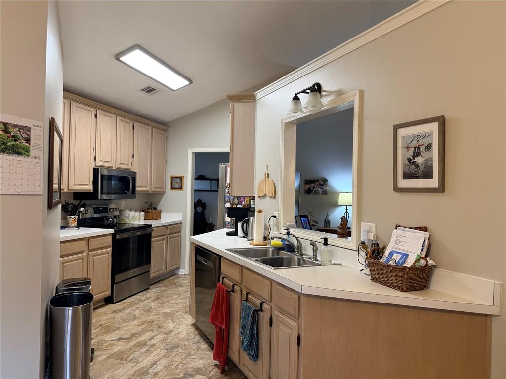 3680 Hamilton Dam Road Dacula, GA 30019 - Photo 6 of 33 a kitchen with a sink stove top oven and refrigerator