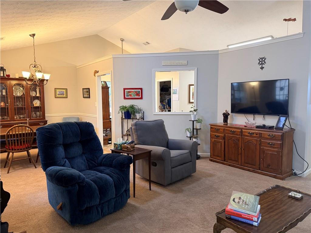 3680 Hamilton Dam Road Dacula, GA 30019 - Photo 9 of 33 a living room with furniture and a flat screen tv