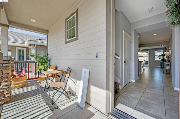 a kitchen with granite countertop stainless steel appliances a stove a microwave and cabinets