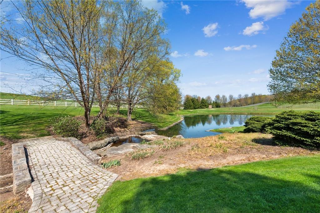 152 Justabout Road Venetia, PA 15367 - Photo 11 of 50 a view of a lake with a big yard