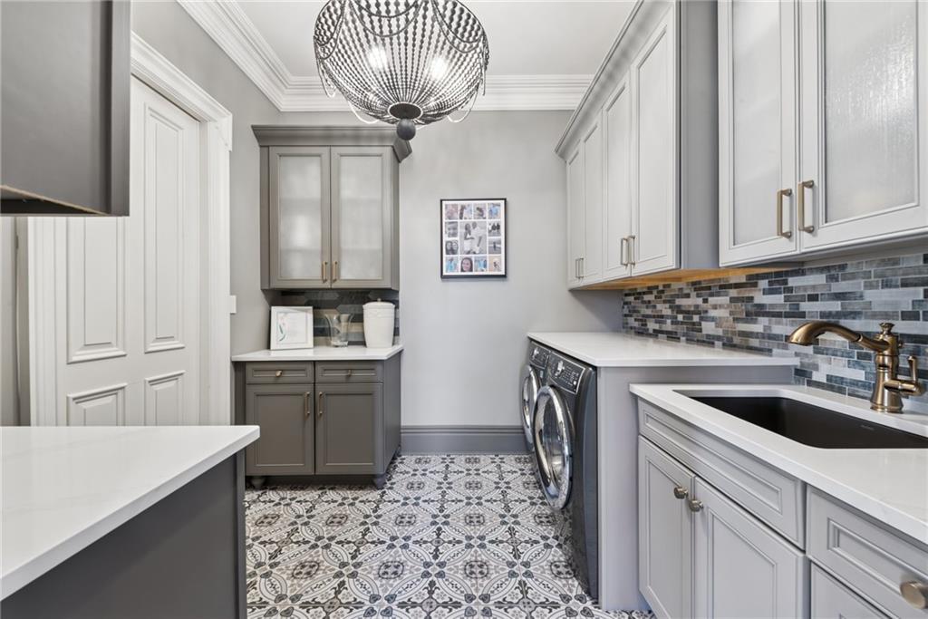 152 Justabout Road Venetia, PA 15367 - Photo 19 of 50 a kitchen with a sink a stove and cabinets
